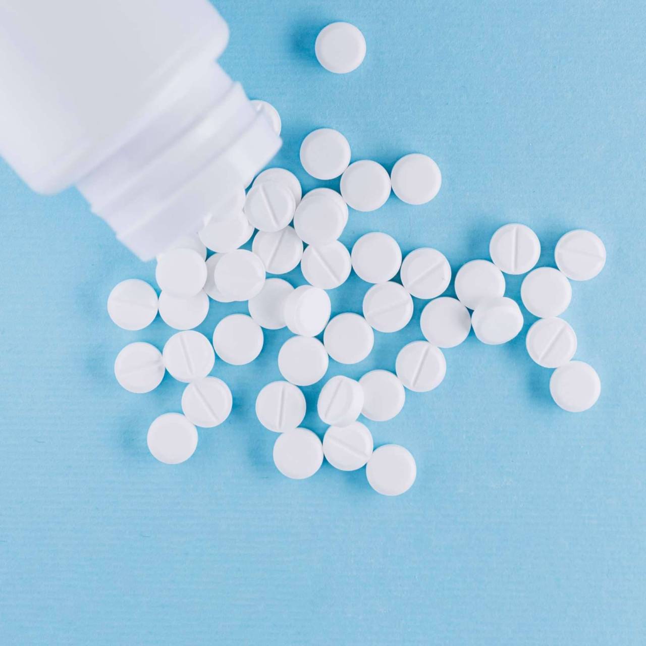 white-pills-plastic-bottle (1) (2)